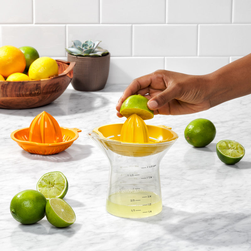 Presse citron et orange avec récipient